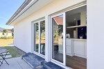 HORN IMMOBILIEN ++ Winkelbungalow 5 km bis Neubrandenburg, Baujahr 2022, Doppelgarage + Carport - Einfamilienhaus Sponholz | Angebot:27069443