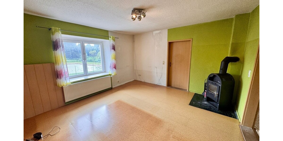 Zimmer mit Kaminofen